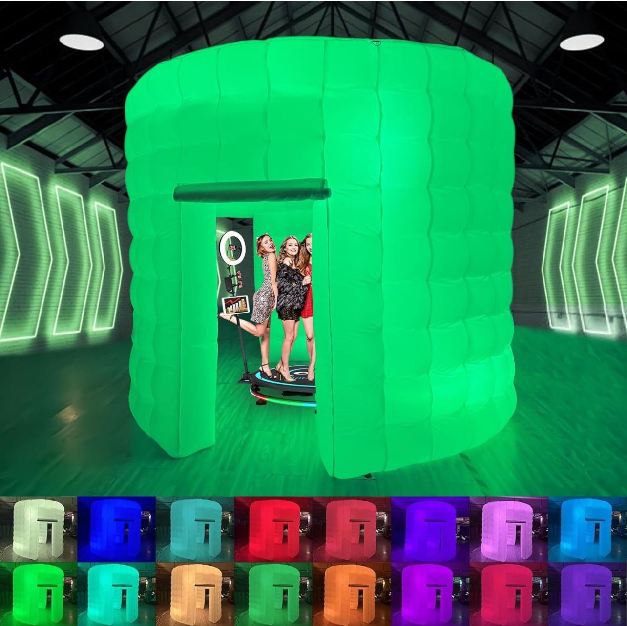 Green inflatable photo booth with people inside, surrounded by LED lights and various color options displayed below.